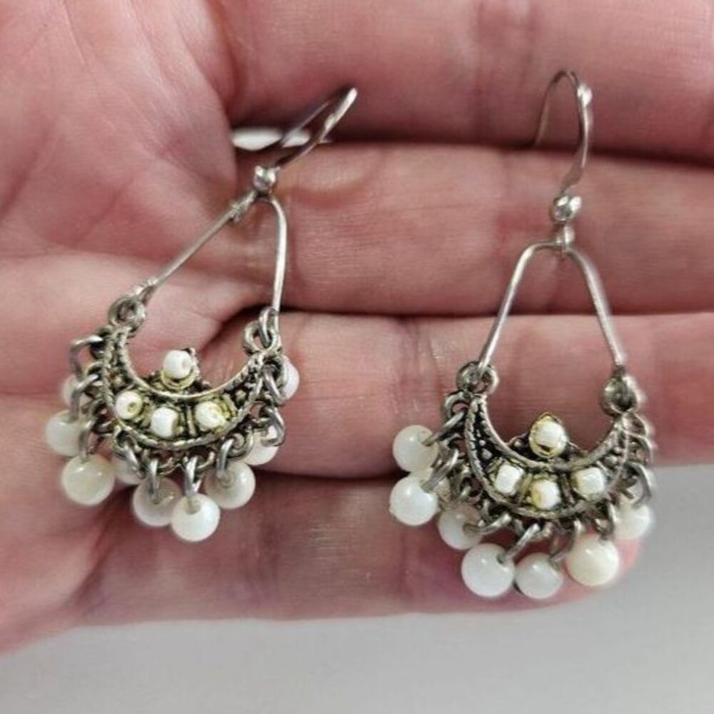 Silver tone white bead dangling earrings